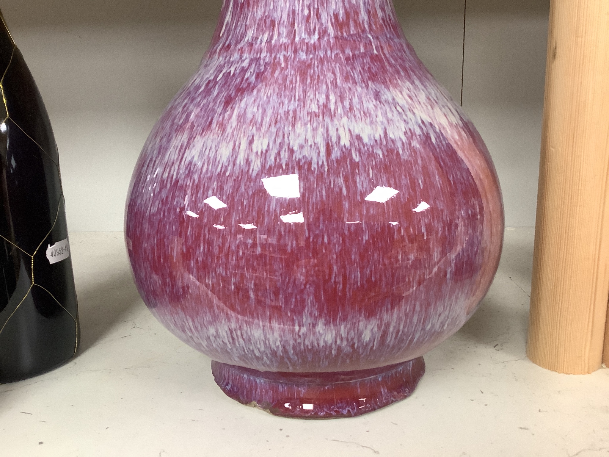 A Chinese crimson flambé glazed vase, 32cm